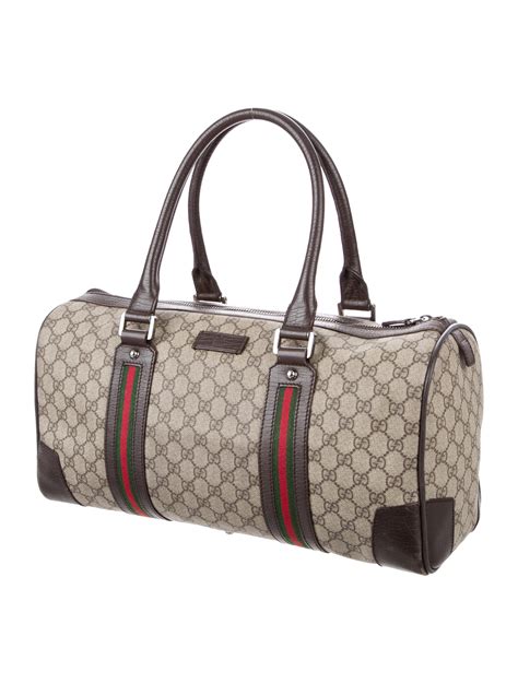 gucci duffle bag.